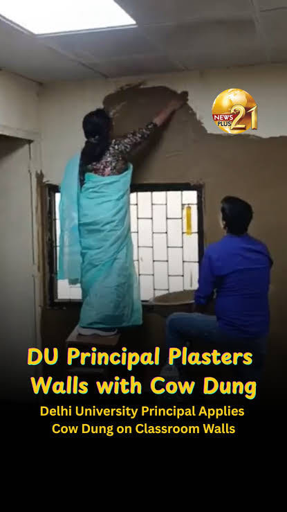Principal in Delhi University applying Cow dung (Gobar) on t