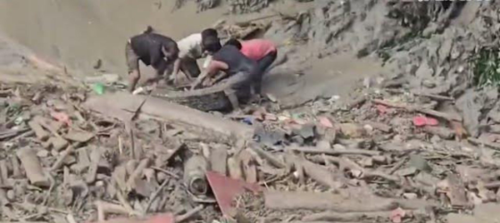 A catastrophic flash flood and landslide struck the Nepal–Ti